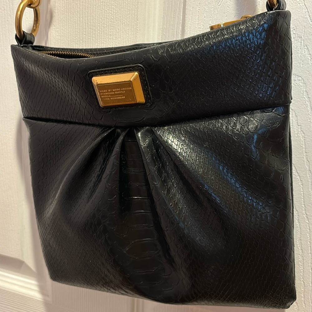Black snakeskin Marc Jacob’s cross body bag. In very good condition.